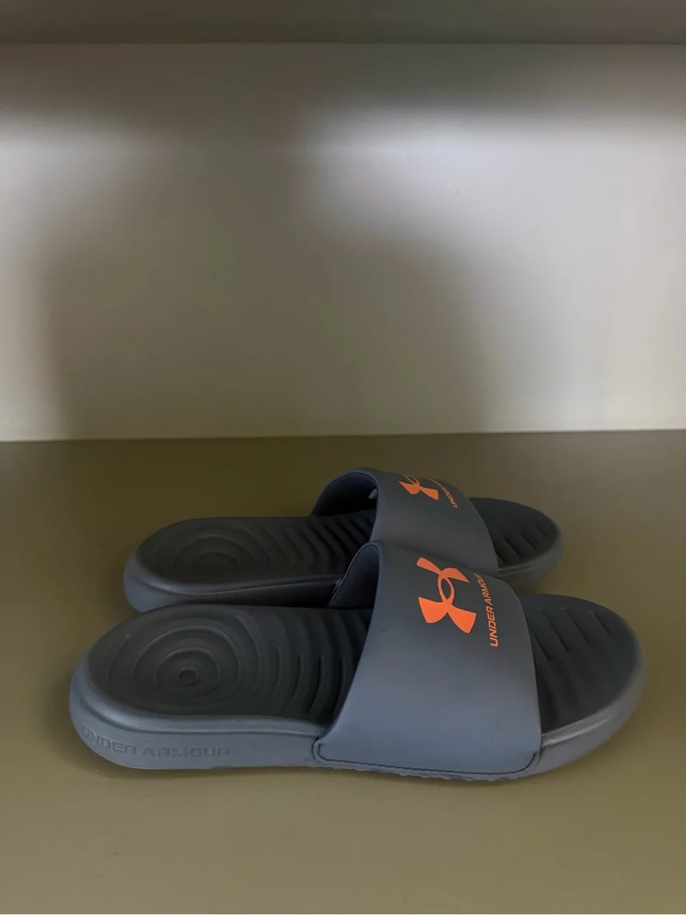 Under Armour Navy Slides with Orange Logo Accents
